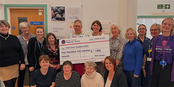Presenting a cheque  at the Seamoor Unit 